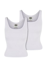 Top in cotone bianco a coste con spalline larghe e scollatura profonda, caratterizzati da una silhouette aderente. Due top identici sono esposti.
