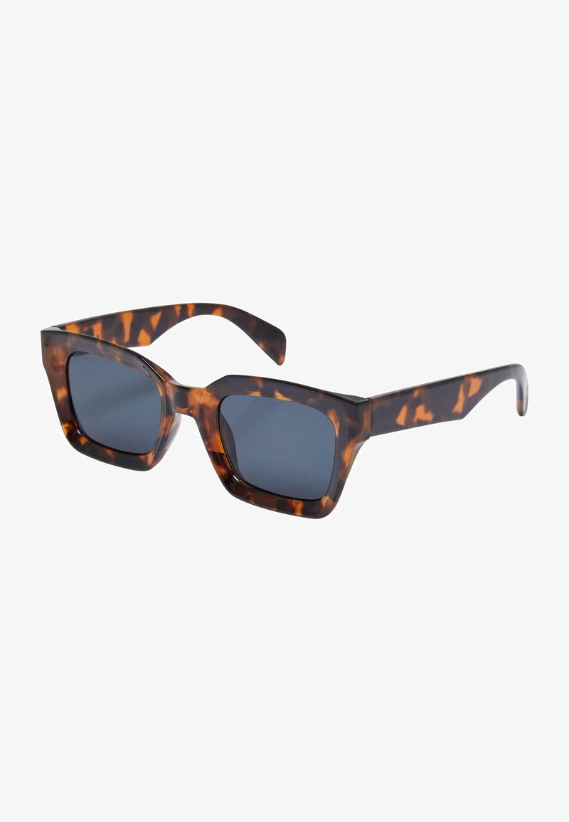 Sonnenbrille aus Schildpatt mit dicken, quadratischen Rahmen und dunklen Gläsern. Verfügt über eine glänzende Oberfläche und ein unverwechselbares Muster in Brauntönen und Bernstein.