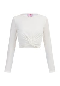 Top cropped bianco a maniche lunghe con scollatura rotonda, caratterizzato da un dettaglio annodato sul davanti e tessuto a coste testurizzato.