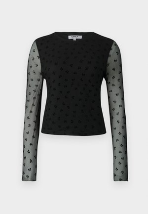 Zwarte langemouwen top met doorschijnende mesh mouwen, voorzien van een textuurpatroon van kleine zwarte bloemvormen. Ronde halslijn, cropped pasvorm.