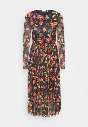 Robe midi noire à manches longues transparentes, jupe plissée, avec un imprimé floral orange, rouge et jaune sur toute la longueur.