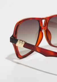 Le Specs UNISEX brązowy