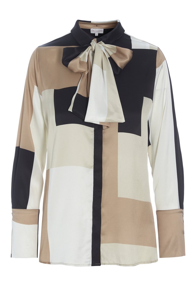 Blouse à manches longues en matière soyeuse avec un col noué. Les blocs de couleurs comprennent beige, blanc, noir et camel atténué. Design classique du col.