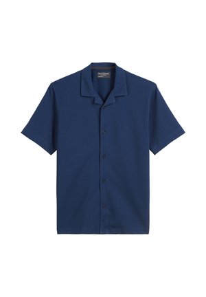 Chemise à manches courtes bleu marine avec des boutons, col camp et tissu texturé.