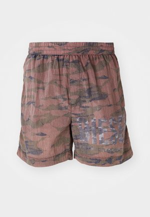 Camo-print shorts in earthy tones with an elastic waistband. Features a faded “DIESEL” logo on the left side. Lightweight texture.