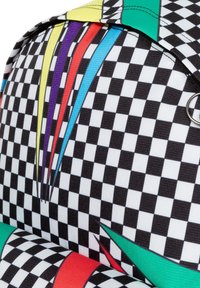 Colored geometric design on black and white checkered fabric; features vibrant stripes in red, blue, yellow, and green. Metal hardware accent.