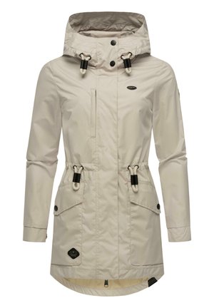 Light beige rain jacket featuring a hood, drawstring waist, two front pockets, snap closures, and a longer back hem. Waterproof material.