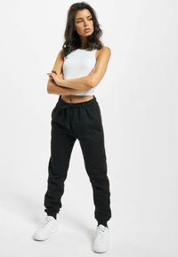 DEF LOLA - Verryttelyhousut - black