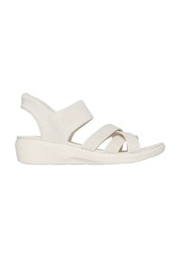 Sandalias de cuña blancas con correas texturizadas, diseño de punta abierta, banda elástica y suela contorneada. Material ligero para mayor comodidad.