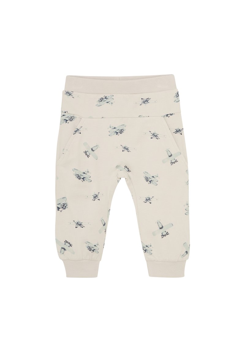 Krämfärgade byxor med elastisk midja och cuffs, försedd med ett mönster av ljusblå flygplan och helikoptrar. Två sidofickor ingår.