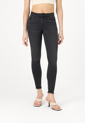 Vaqueros pitillo - black denim