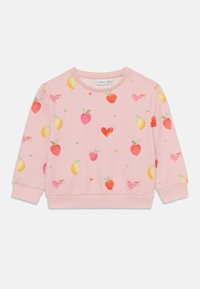 Rosa hettegenser med fruktmønster, inkludert jordbær, sitroner og kirsebær, med ribbestrikkede mansjetter og nederkant. Mykt materiale.