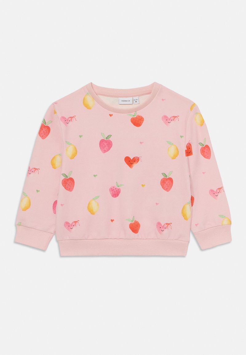 Pink sweatshirt featuring a fruit pattern, including strawberries, lemons, and cherries, with ribbed cuffs and hem. Soft material.