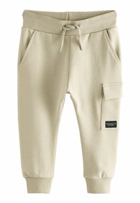 Beige sweatpants med ribbet talje og manchetter, med sidelommer og en cargo-lomme med et logopatch som detalje.