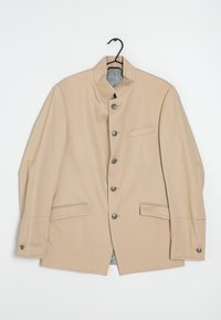 Beżowa kurtka z kołnierzykiem mandaryńskim, metalowymi guzikami, dwoma przednimi kieszeniami i gładką fakturą. Posiada pojedynczą kieszeń na piersi oraz szerokie rękawy.