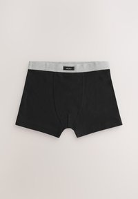 Boxer noirs en tissu doux, avec une ceinture élastique gris clair ornée de l'étiquette de la marque "NEXT". Design simple sans motifs.