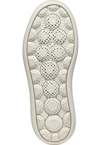 Sole di scarpa bianca con motivi circolari e punti texture per la presa. Sono visibili perforazioni per traspirabilità e flessibilità.