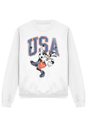 Weißer Sweatshirt mit großem blauem und rotem "USA"-Text und einer Cartoonfigur, die vor den Buchstaben einen Fußball kickt.