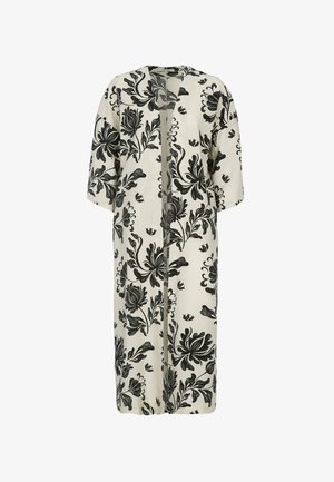 Lang cremefarvet kimono-stil frakke med brede ærmer og dristigt sort blomstermønster over det hele, åben front.