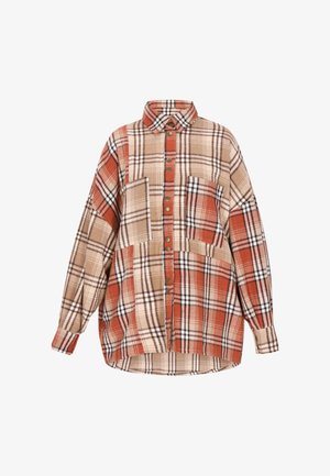 Koszula flanelowa w kratę w odcieniach pomarańczowego, beżowego i czarnego. Posiada zapięcie na guziki z przodu, kołnierzyk oraz dwie kieszenie z przodu.