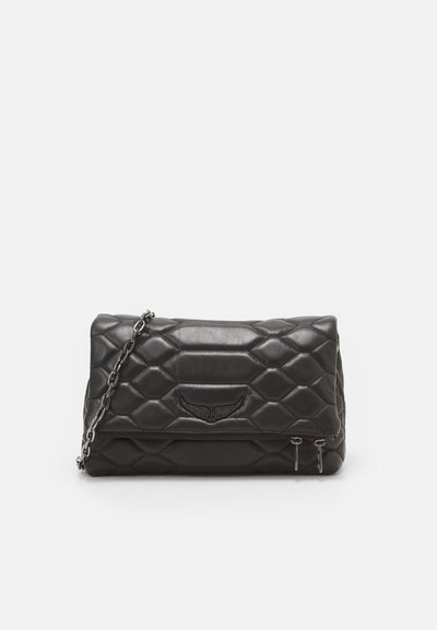 Black quilted handbag with a rectangular shape, featuring a chain strap, embossed logo, and zippered pocket on the front.