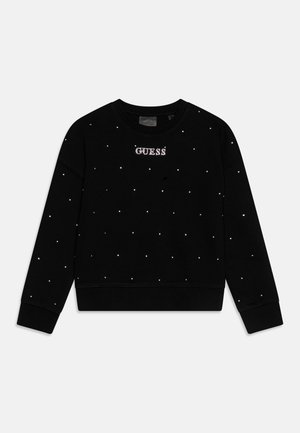 Čierna mikina s okrúhlym výstrihom, s textúrovaným povrchom a roztrúsenými akcentmi z kryštálov, vrátane loga "GUESS" vyrobeného z kamienkov.