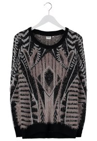 Maglione nero e beige con un motivo testurizzato e peloso caratterizzato da design geometrici. Tessuto a maglia con colletto e orlo inferiore a coste.