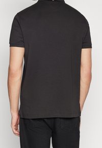 Tommy Hilfiger Polotričko - black