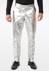 Silver metallic trousers with a shimmering finish, straight cut, front pockets, and a button closure, paired with black dress shoes.