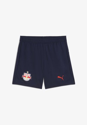 Granatowe szorty sportowe wykonane z gładkiego materiału, z logo Red Bull Salzburg oraz czerwoną logo Pumy na dolnym prawym boku. Elastyczny pas.