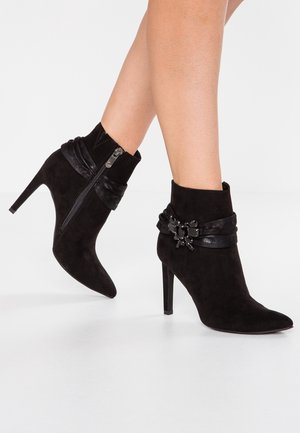 Bottines à talons hauts - black