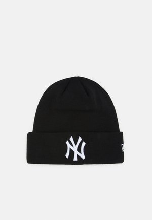 Berretto in maglia nera con risvolto, caratterizzato da un logo ricamato bianco dei New York Yankees sul davanti e un piccolo tag del logo di lato.