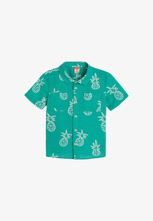 Kortærmet skjorte i turkisk stof med et hvidt ananasmønster, krave og lomme med knaplukning. Lett materiale.