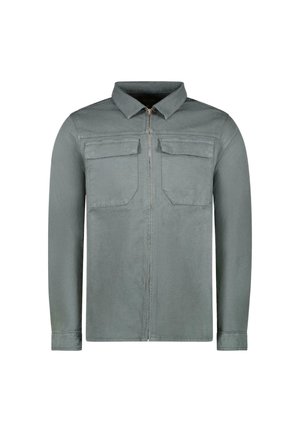 Tactische stijl shirt in gedempt groen, met een rits aan de voorkant, twee borstzakken en lange mouwen met knoopmanchetten. Ge textured stof.