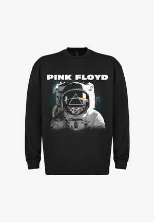 Sort sweatshirt med et grafisk motiv af en astronaut med et spejlet hjelm. Teksten siger "PINK FLOYD" i fed hvid over designet.