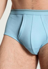 Lichtblauwe katoen onderbroek met een zachte textuur, met een effen kleur, elastische tailleband en voorplooidesign.