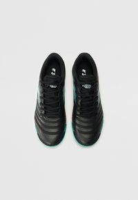 Black athletic shoes with horizontal stripes, featuring a smooth texture and a green and red outsole. Laces are black with a logo on the tongue.