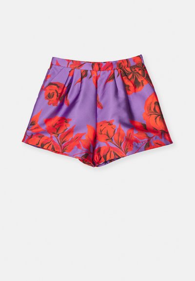 Purple satin shorts with a vibrant red floral print, featuring a folded waistband and pleats for added texture and style.