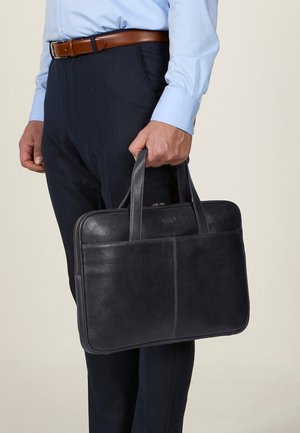 Black leather laptop briefcase with two top handles, zip closure, and a smooth texture. Neatly structured with subtle stitching details.