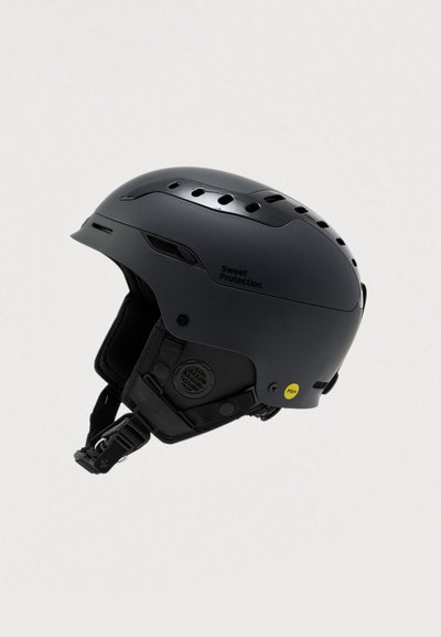 Zwarte skihand met ventilatiegaten, verstelbare kinband en padding. Voorzien van logo en MIPS-sticker voor extra veiligheid.