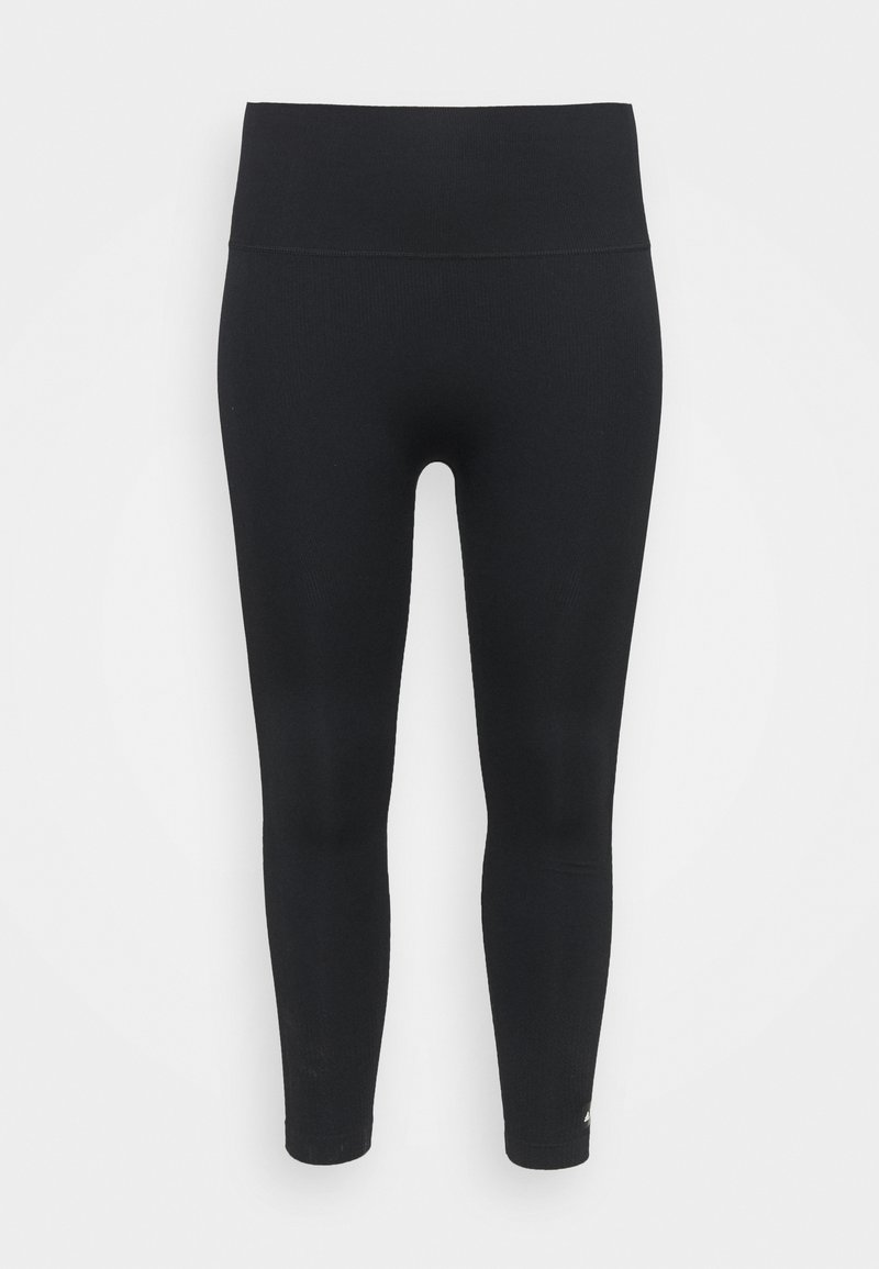 Leggings neri con vita alta, realizzati in materiale elasticizzato. Presentano una texture liscia e una lunghezza cropped, ideali per l'abbigliamento sportivo.