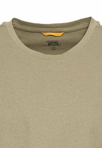 Beige bomulds t-shirt med rund halsudskæring, med et orange mærke. Enkel, ensfarvet med en glat tekstur, velegnet til afslappet brug.
