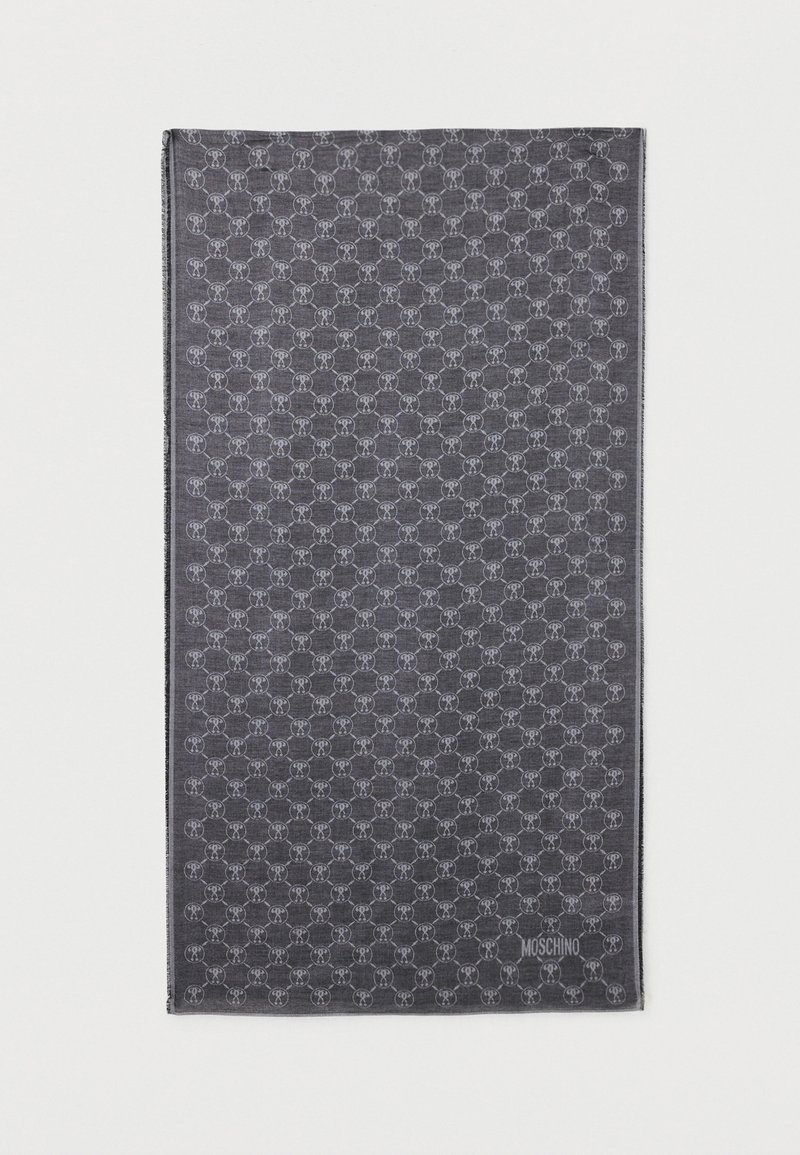 Tmavošedá šatka s opakujúcim sa kruhovým vzorom v svetlejšom odtieni. Okraje sú prešívané; v jednom rohu je viditeľné logo značky.