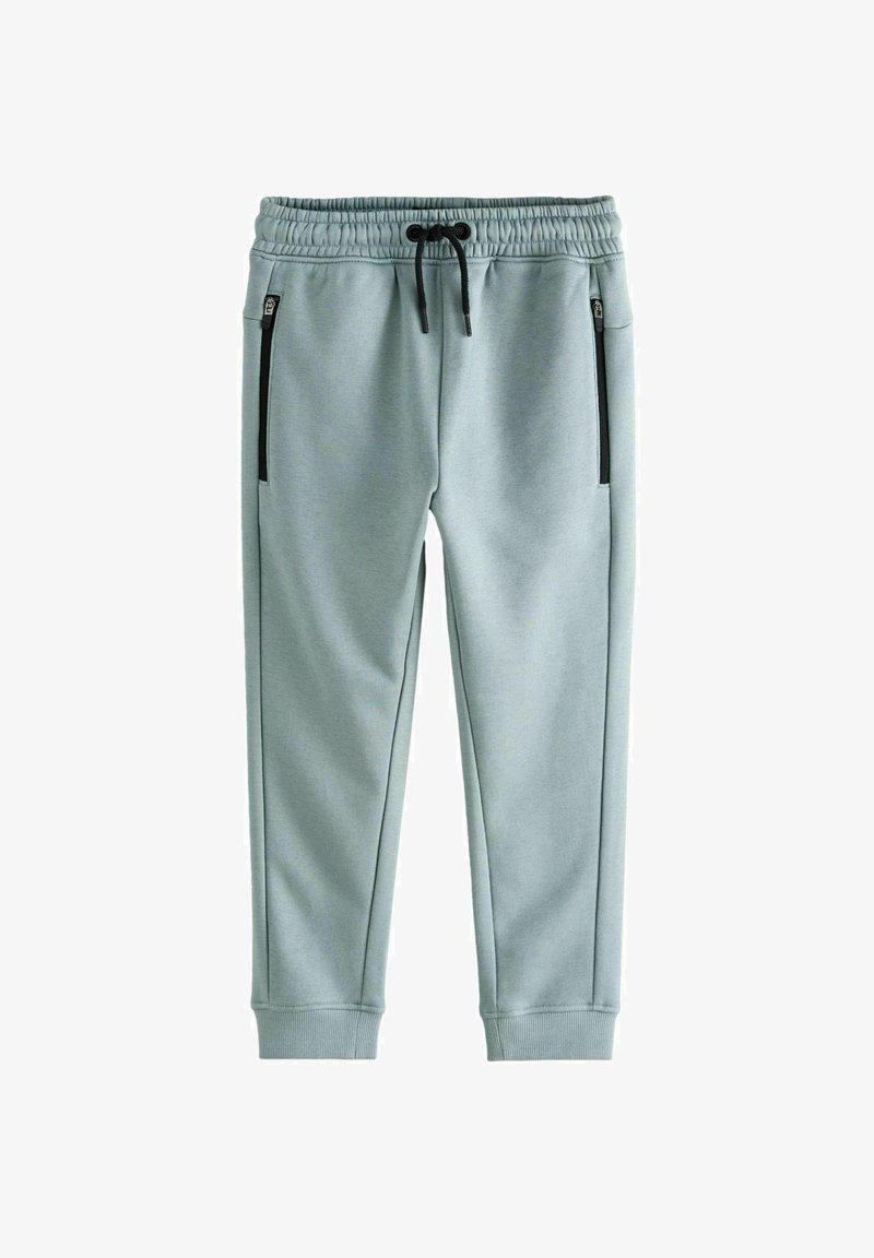 Helle graue Jogginghosen aus weichem Stoff mit einem Kordelzugbund, Knöchelabschlüssen und schwarzen Reißverschluss-Seitentaschen.