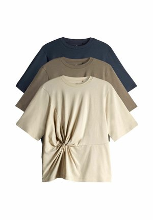 Three short-sleeve t-shirts in beige, olive, and navy. The beige shirt features a knotted front design, all made of soft cotton material.