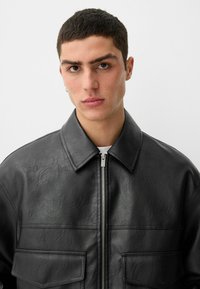 Bershka Faux leather jacket - black