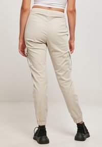 Urban Classics HIGH WAIST COMFORT - Pantalon cargo - softseagrass