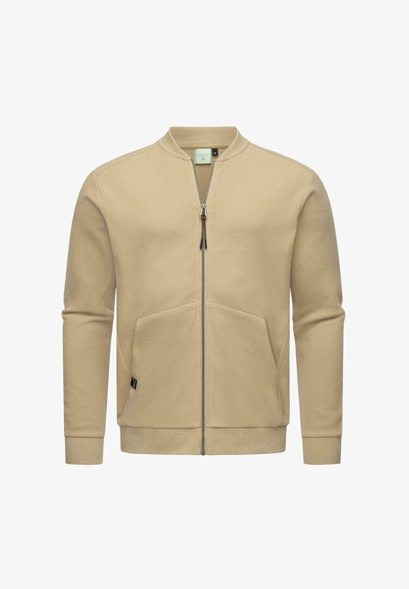 Beige zip-up sweatshirt i texturerat tyg, med ståkrage, två sidofickor och ribbad mudd och nederkant.