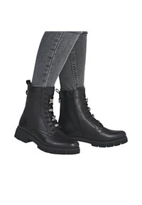 Remonte Bottines à plateau - schwarz