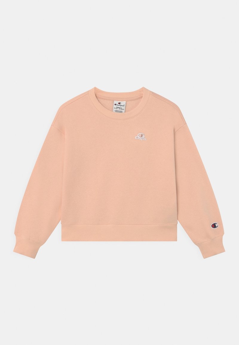 Sweat-shirt léger couleur pêche claire à col rond avec poignets et ourlet côtelés, petit logo blanc sur la poitrine et logo multicolore sur la manche gauche.